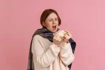 Don't Hold It! The Hidden Hazards of Muzzled Sneezes