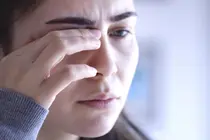A Curtain Over Your Vision: Why Flashing Lights and Black Spots Signal a Medical Emergency