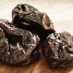 Prunes Ease Constipation, but Concentrated Sugars and Calories Require Caution