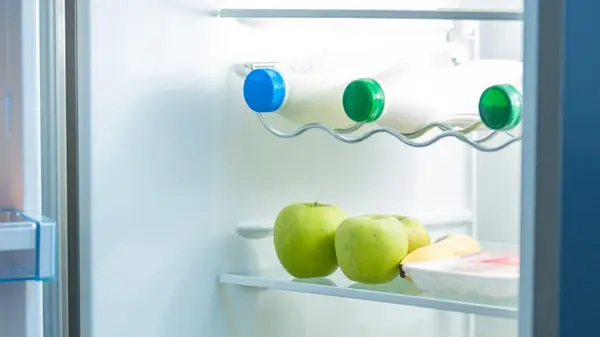 Why Milk, Eggs, and Other Perishables Belong Away From Your Refrigerator Door