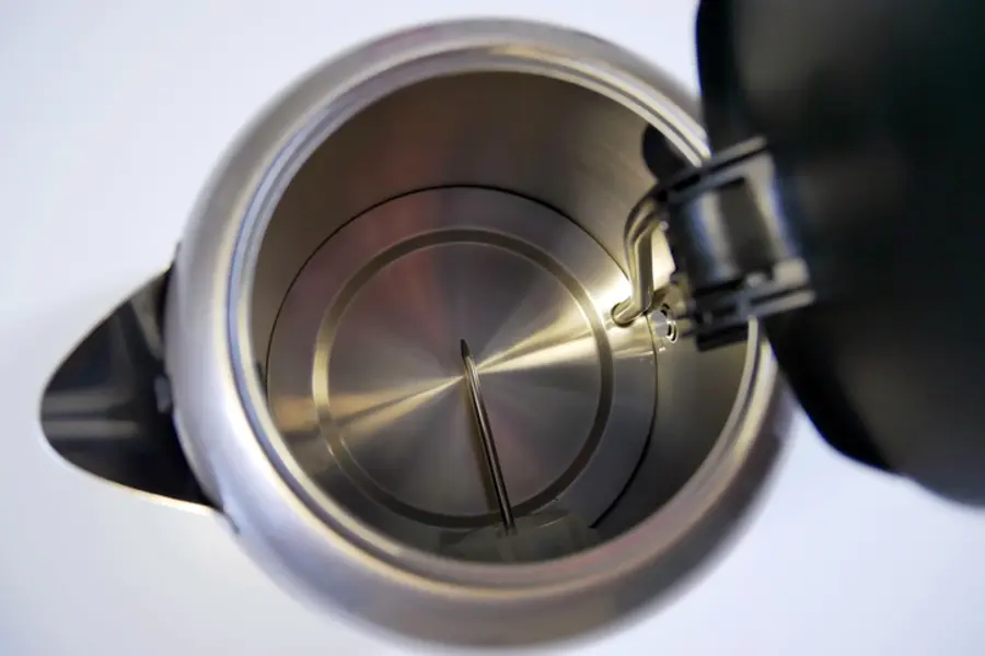 Limescale marks that resemble water stains are a clear sign it's time to clean your kettle. Photo: Getty Images Bank